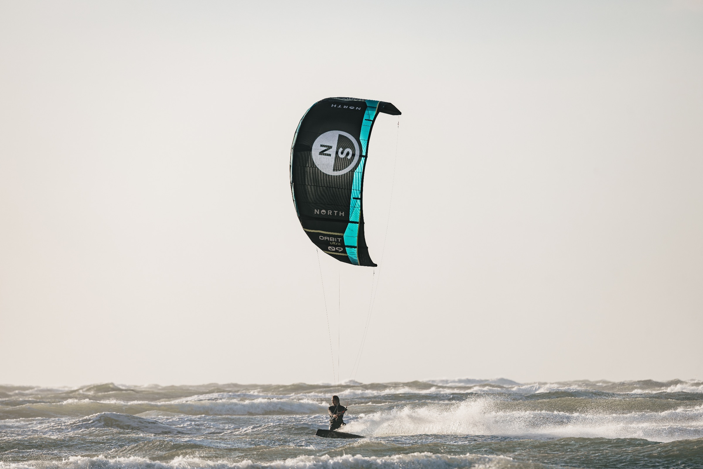 Kitesurfer riding the new North ORBIT ULTRA KITE