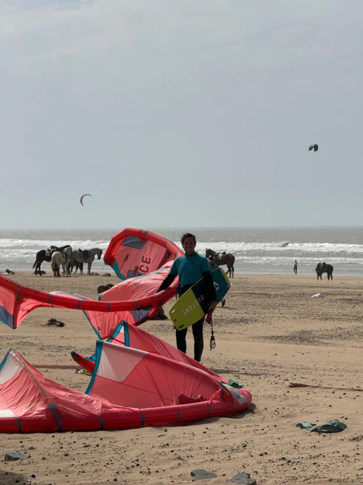 Happy Kitesurfer on a Beach