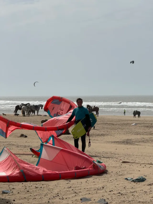 Happy Kitesurfer on a Beach