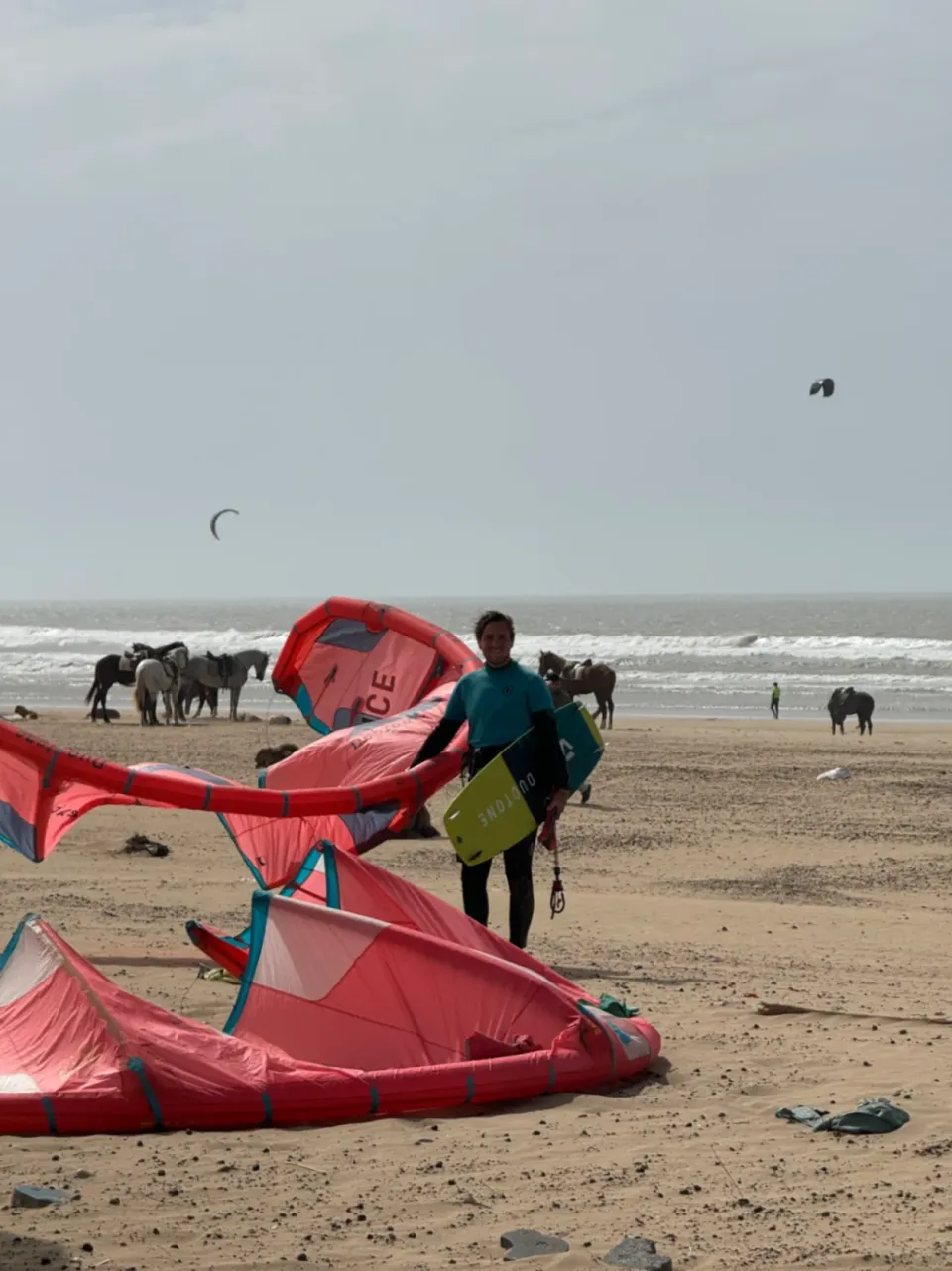 Happy Kitesurfer on a Beach